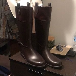 Brown rain boots